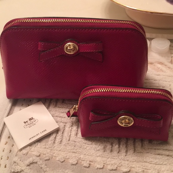 Coach Handbags - Coach magenta pink pouch set